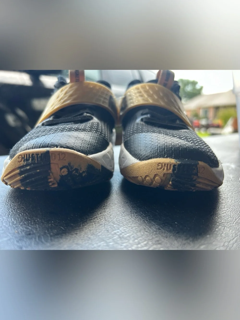 Nike Kids Black and Gold Sneakers